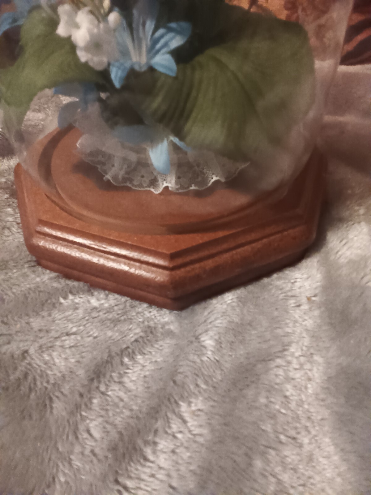 Glass dome blue,green and white artificial flower arrangement,wood base.