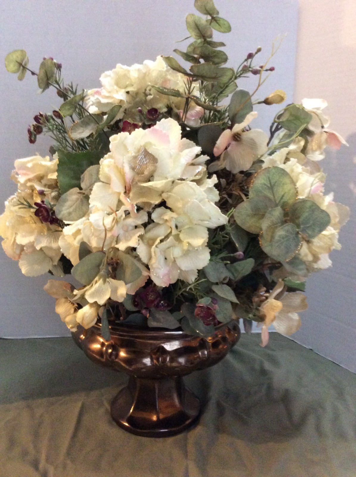 Beautiful Floral Arrangement in Bronze Colored Glass Vase