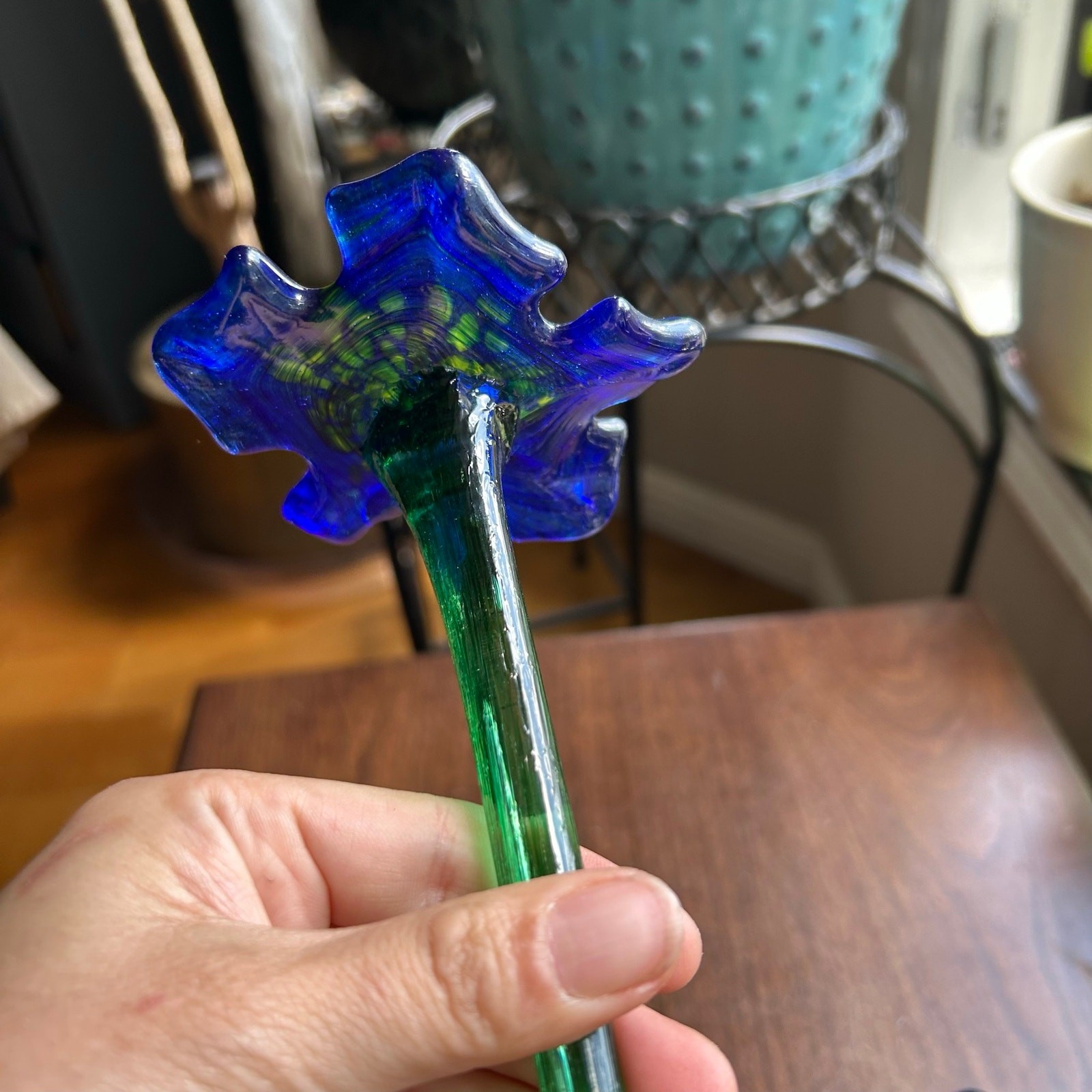 Handcrafted blue and yellow glass flower sculptures long green stems