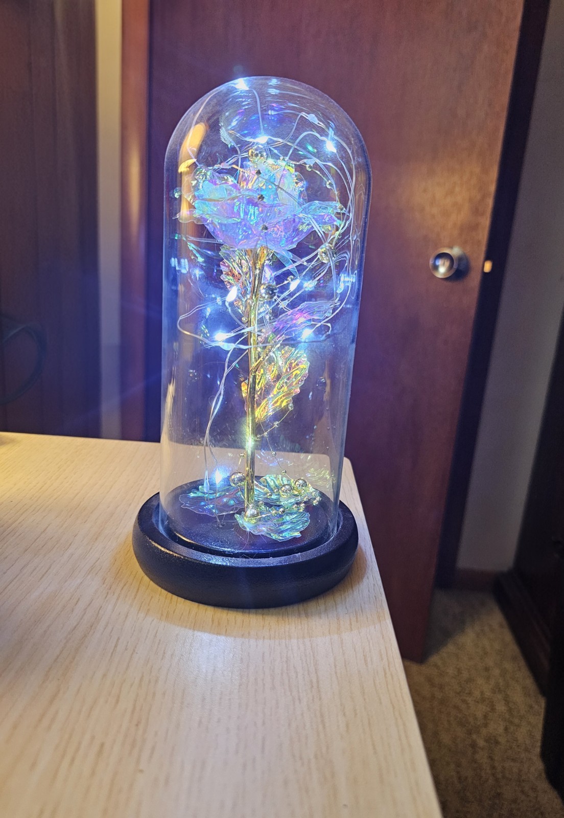 Iridescent Color Changing Flower In Glass Dome