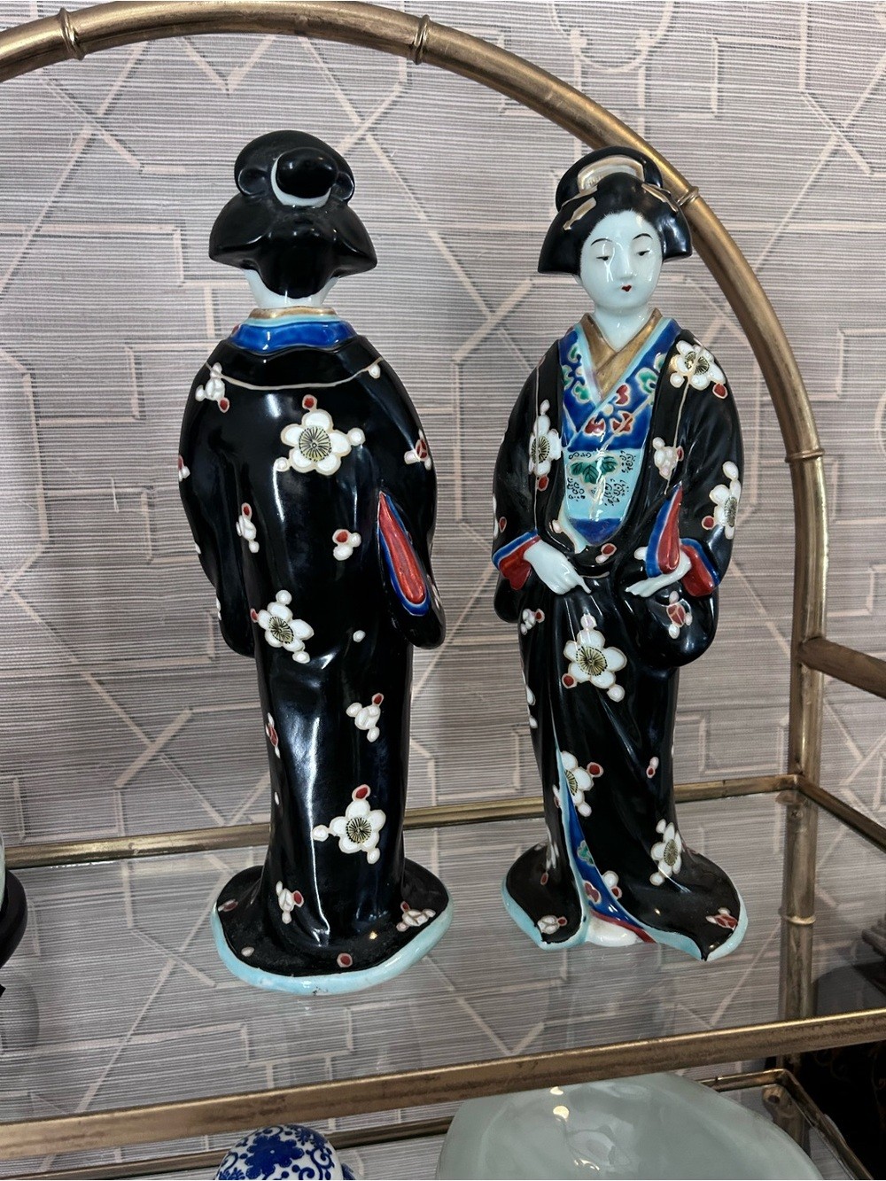 Pair of Black Porcelain Geisha Figurines with Multicolor Accents