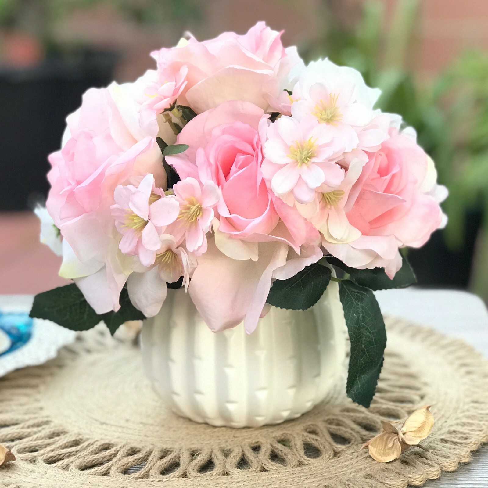 Open Rose and Mixed Flower Arrangement in White Ceramic Vase with Acrylic Water
