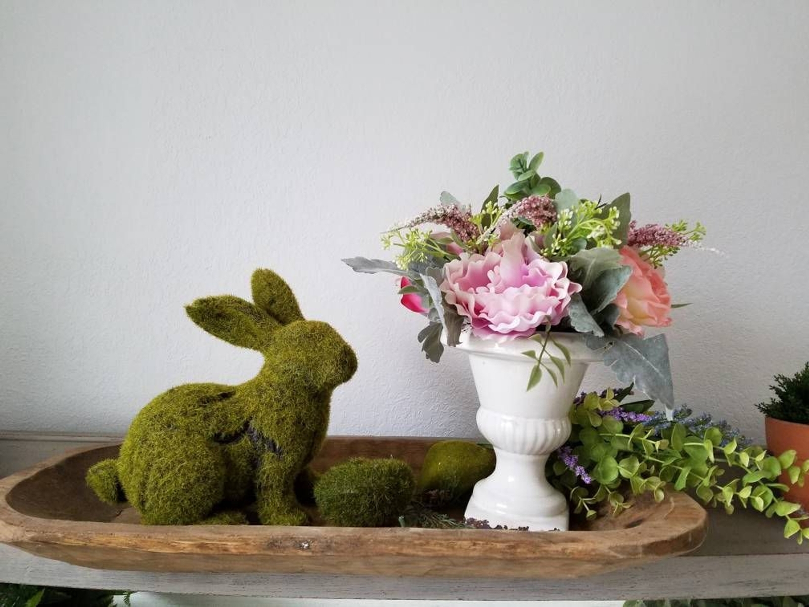 White Urn with faux flowers floral arrangement plants