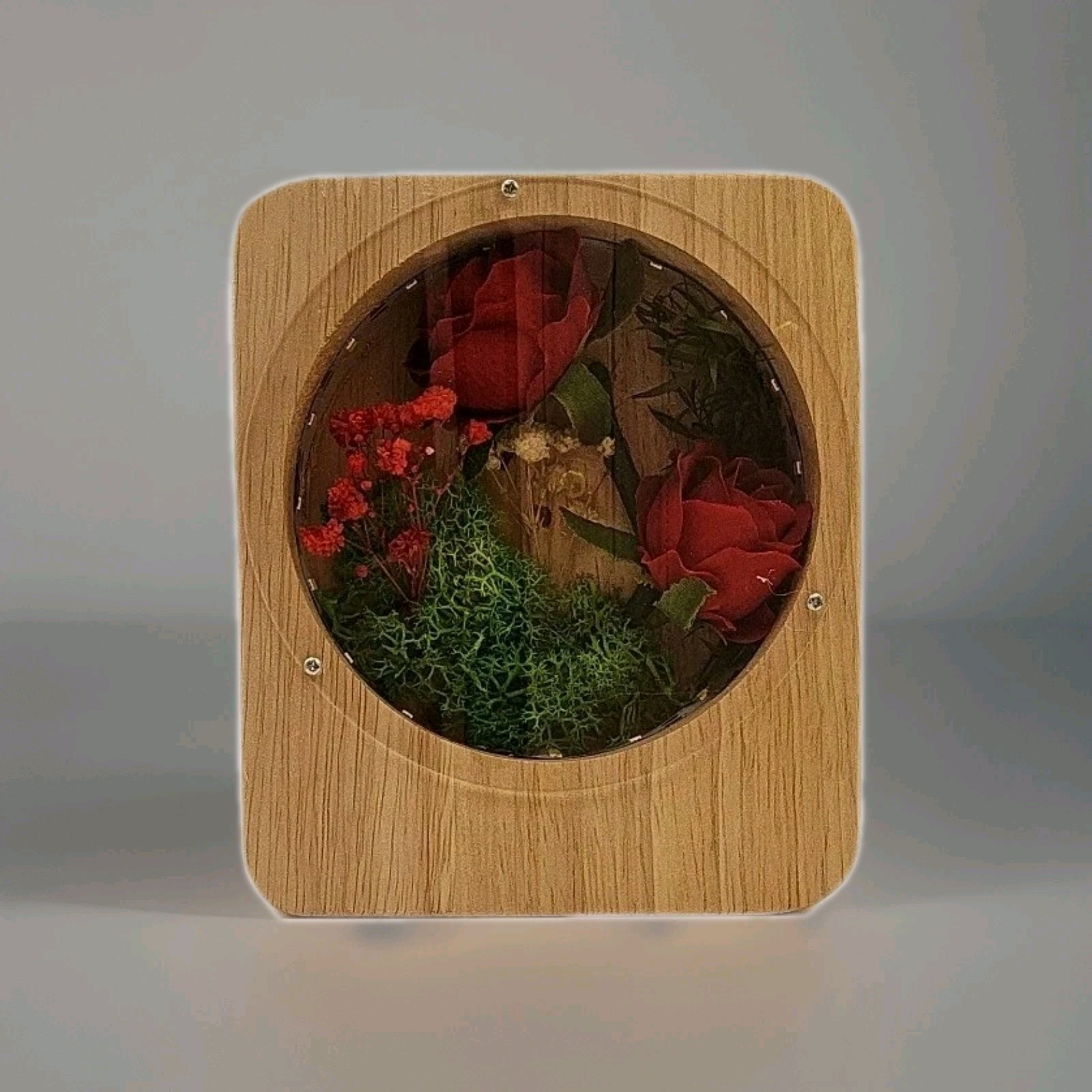 Red Preserved Roses, Green Moss And Small Purple Flowers In Light Up Wooden Box