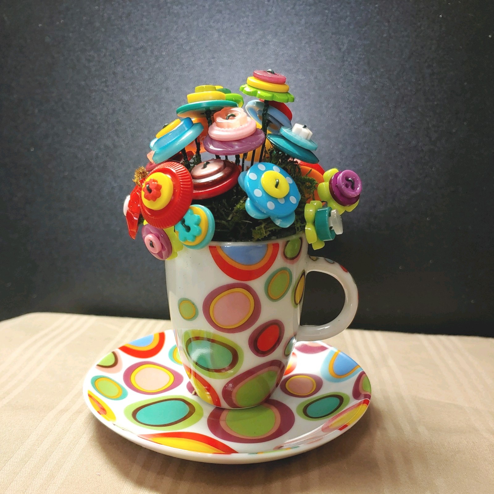 Rainbow Button Bouquet in mini polka dot cup and saucer. only 5 inches tall!