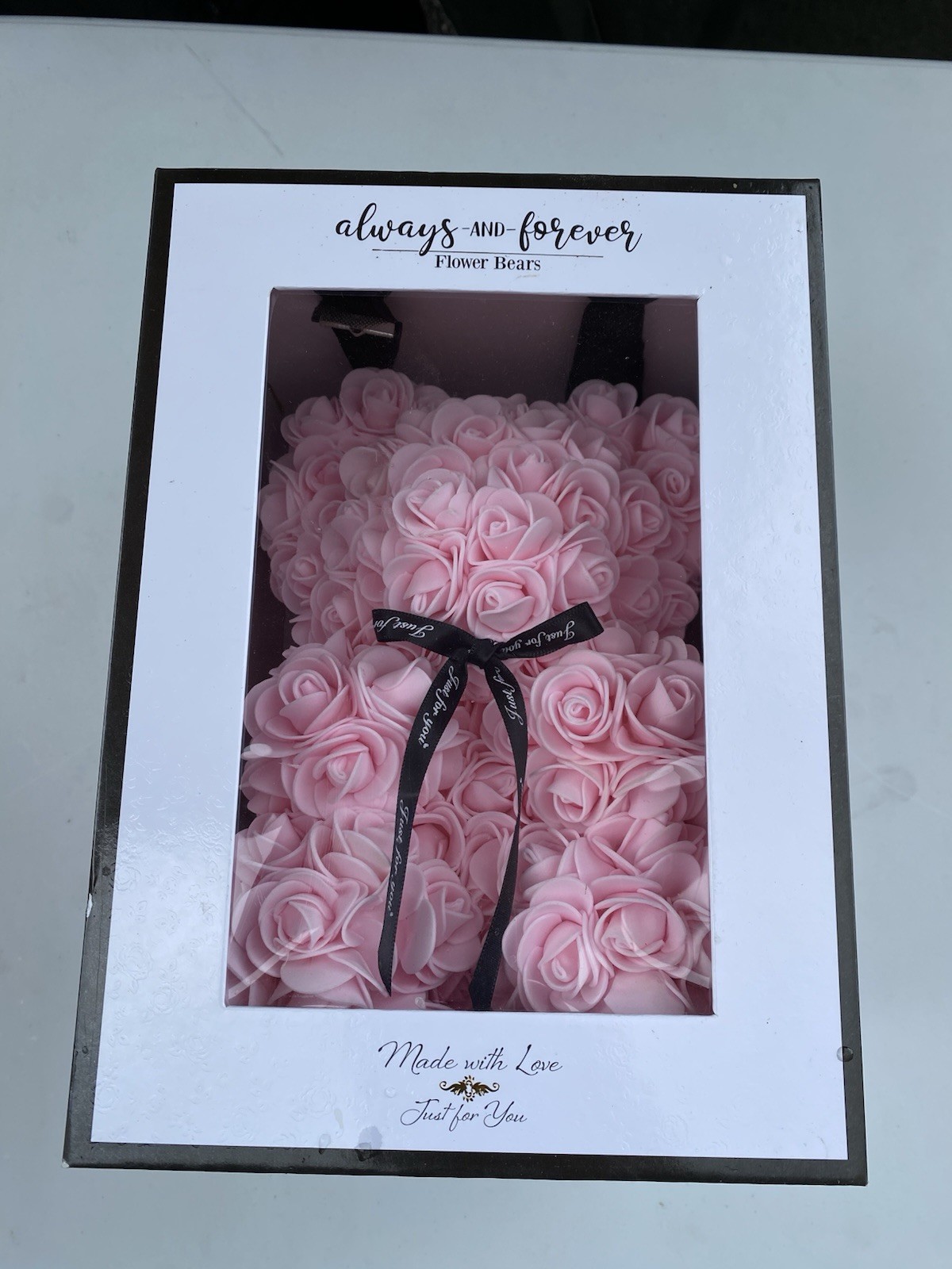 10-inch pink rose bear made of artificial foam flowers