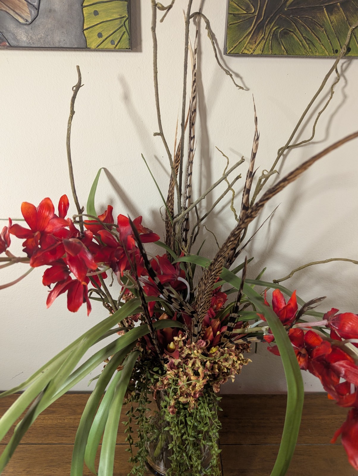 Faux Floral Arrangement With Clear Circular Vase Red Orchards Trailing Greenery