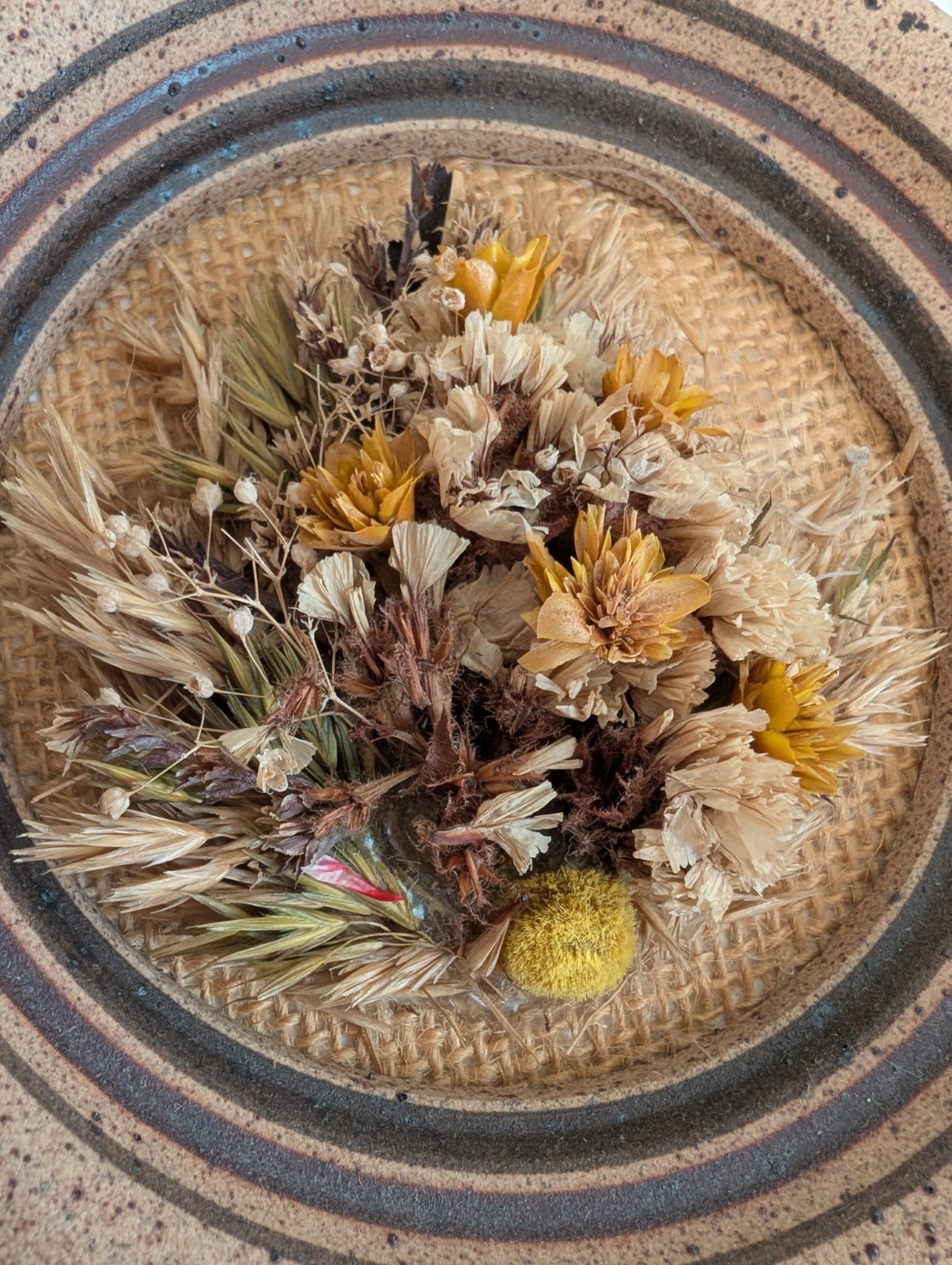 Dried flowers wall hanging round pottery circle speckled floral art boho fall
