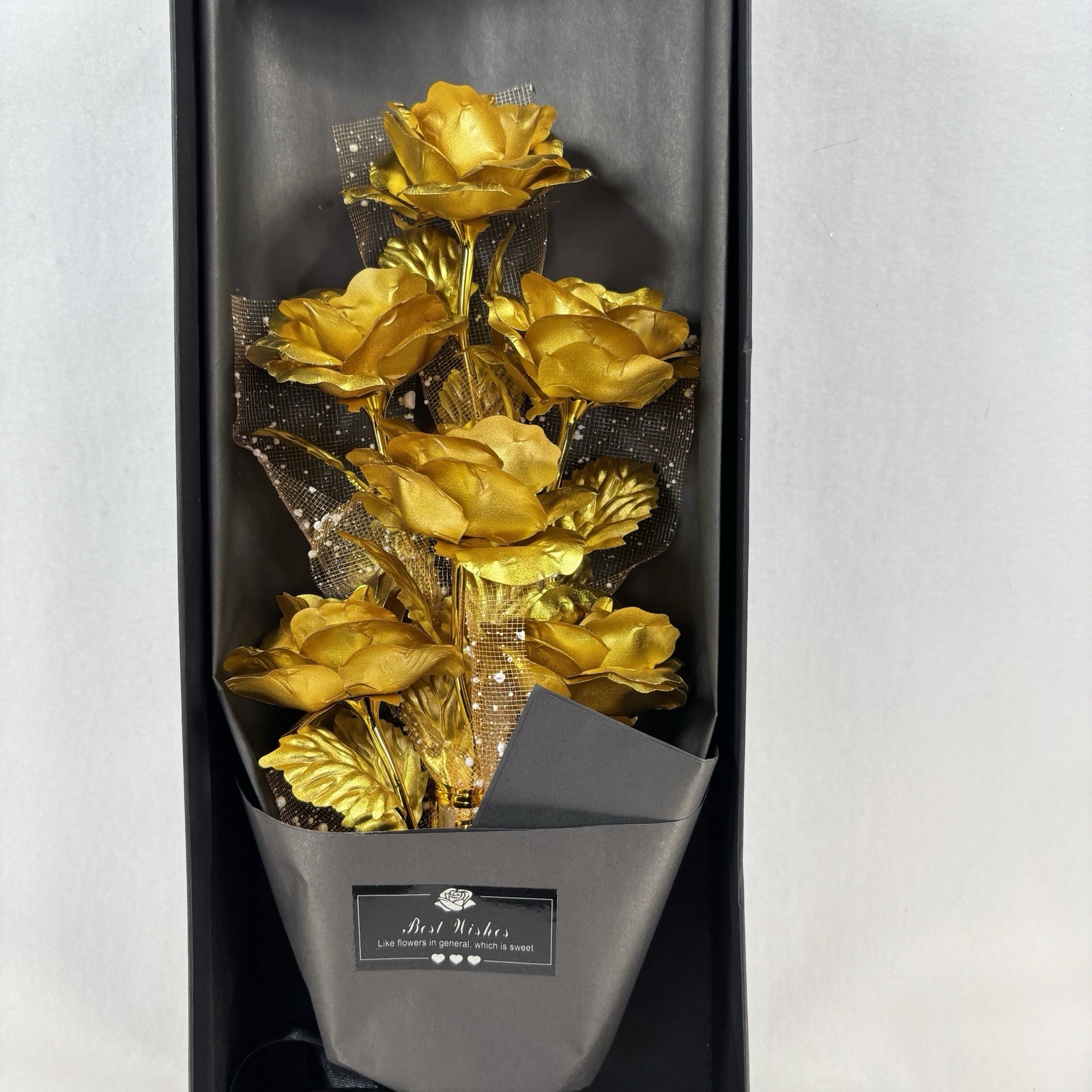 Gold-plated artificial rose bouquet in a black gift box