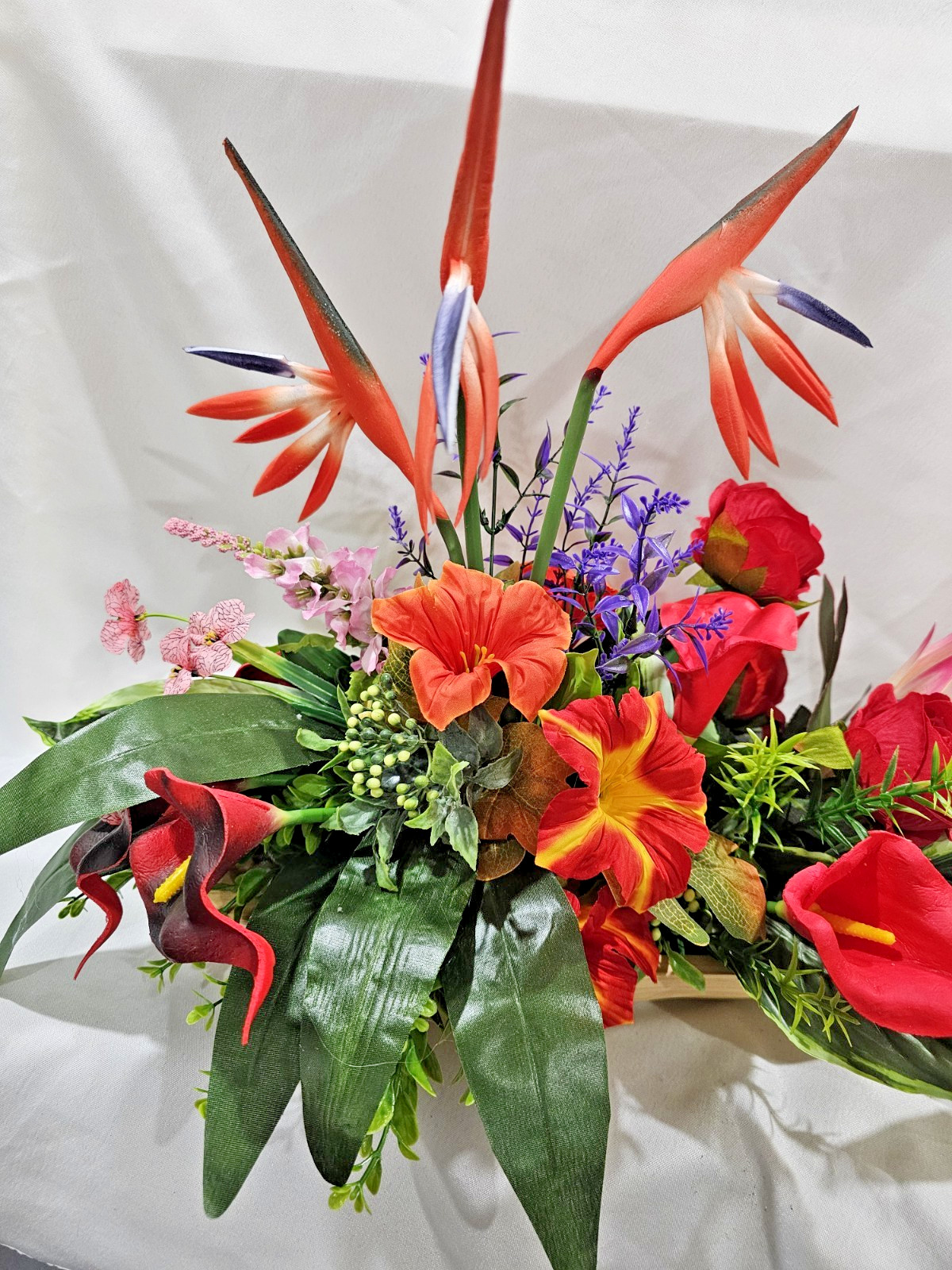 Bright Colors in this Artificial Tropical arrangement, Birds of Paradise etc.