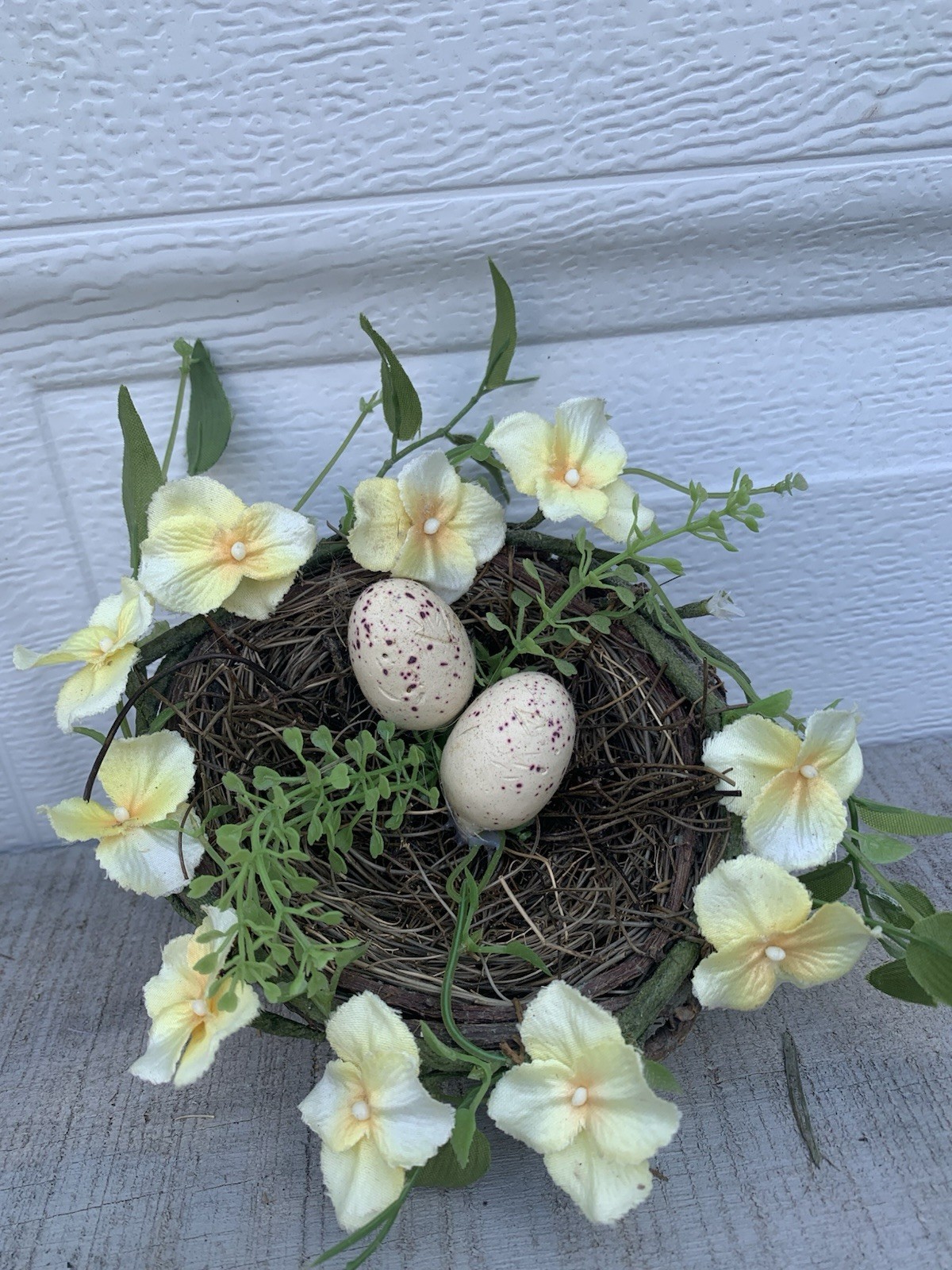Decorative Bird’s Nest With 2 Faux Eggs And Yellow Artificial Flowers Spring