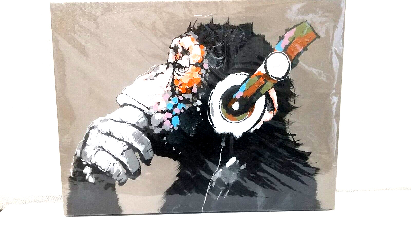 《Chimpanzee Listening to Music》 High Quality Painting Canvas. With Wooden Frame