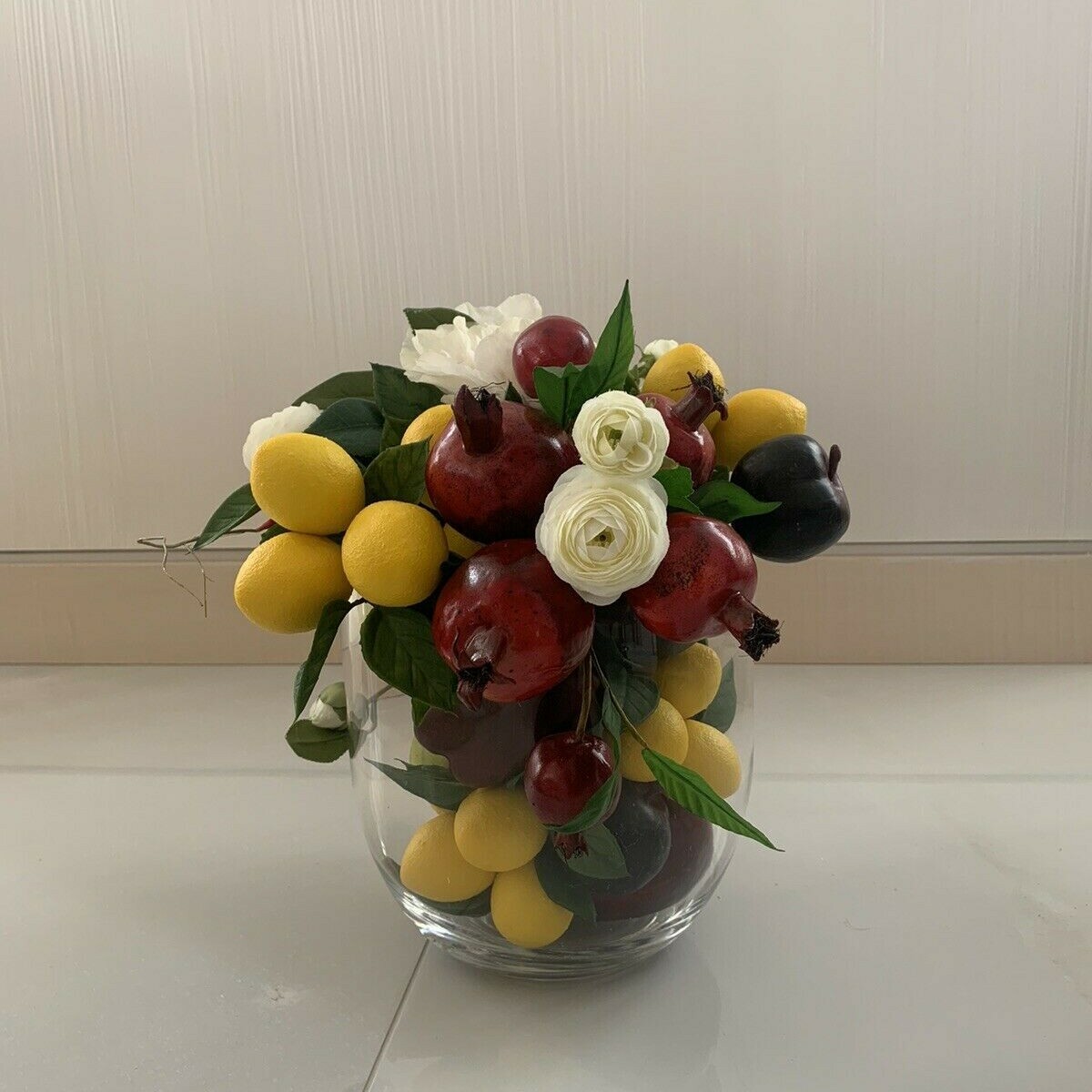 Pomegranate, Lemon, Grapes with Flower Centerpiece Arrangement with Clear Vase 