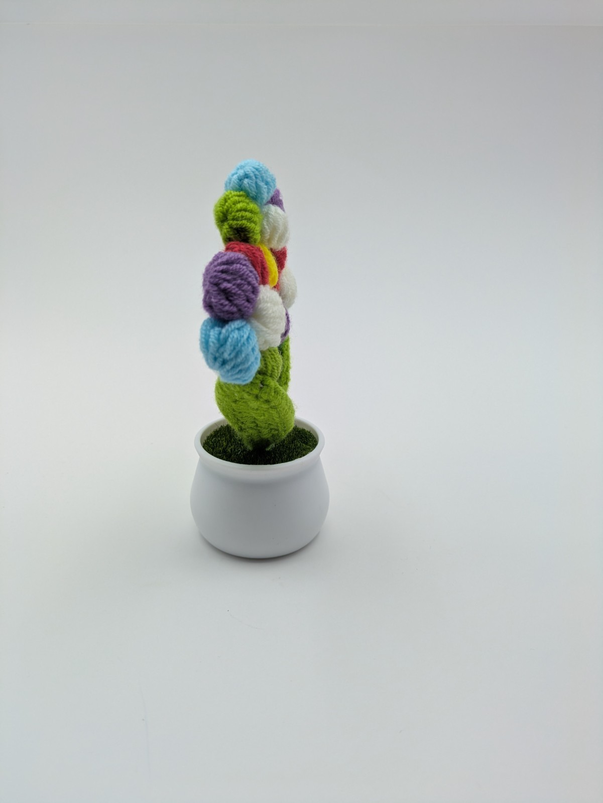 Hand Made Yarn Crochet Rainbow Petal Flowers in White Plastic Pot