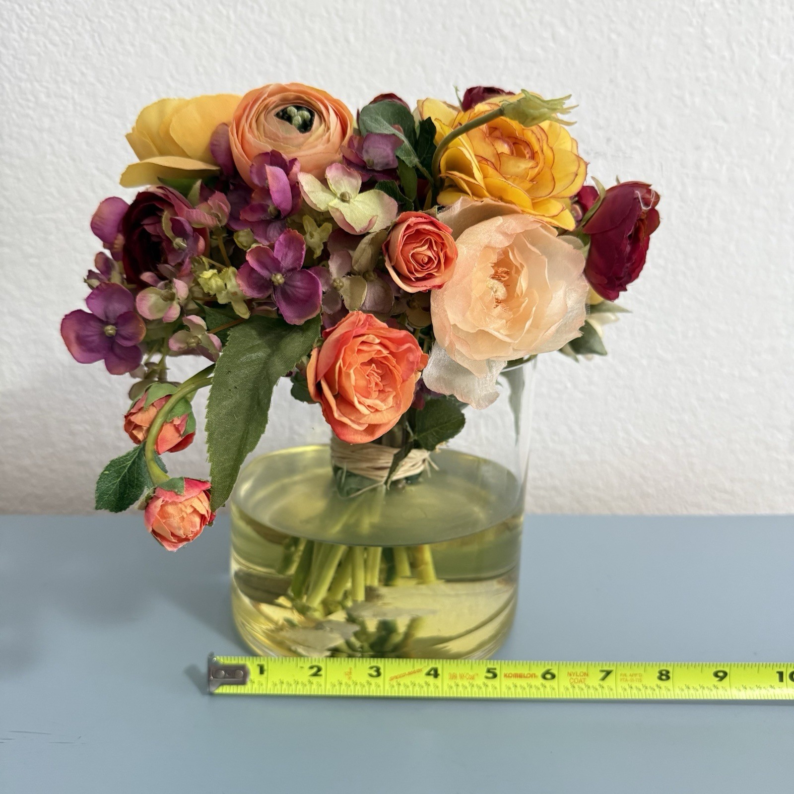 Beautiful Flower Arrangement in Glass Vase with Faux Water.