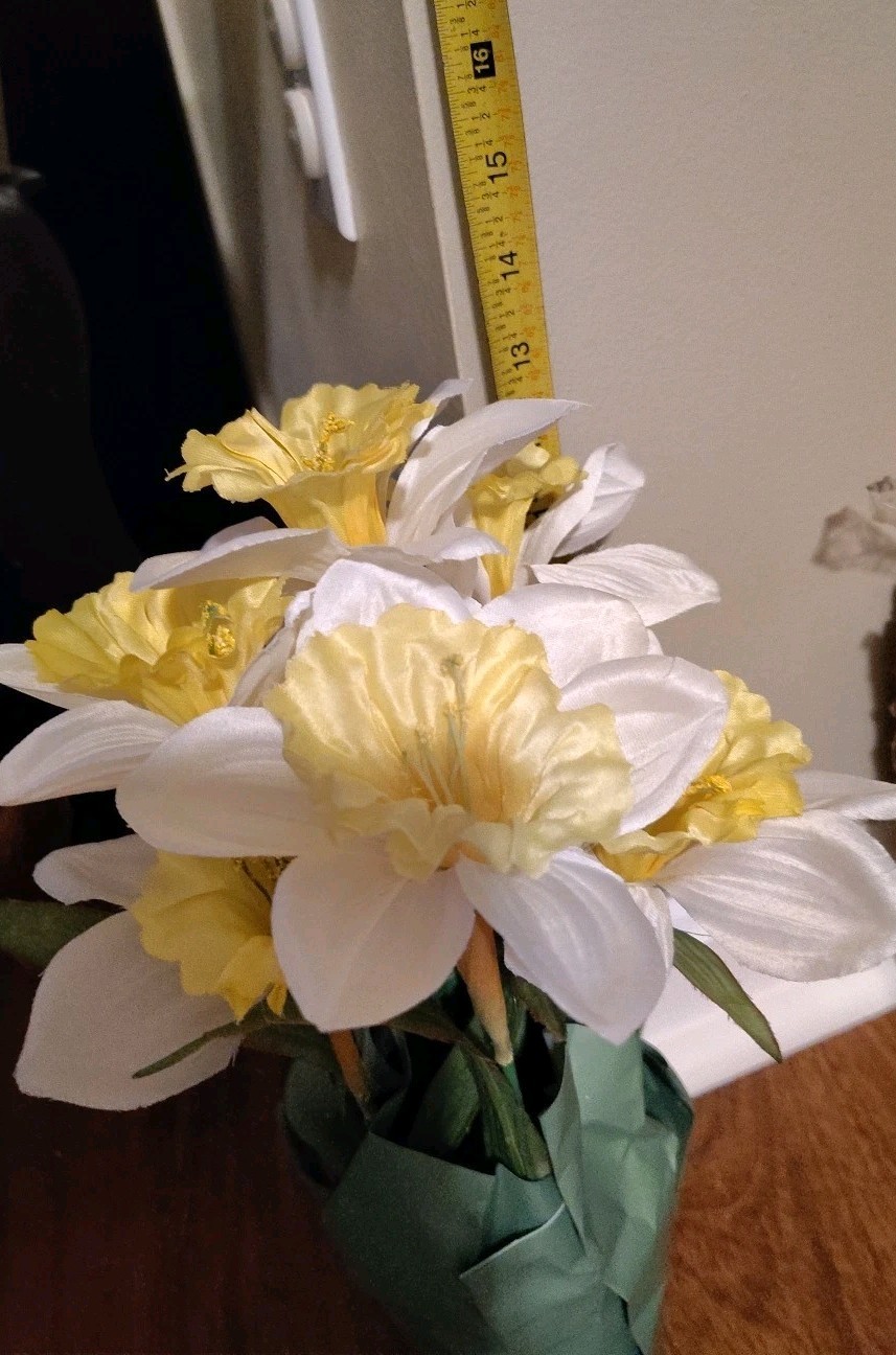 Artificial Yellow And White Daffodils In Pot With Paper