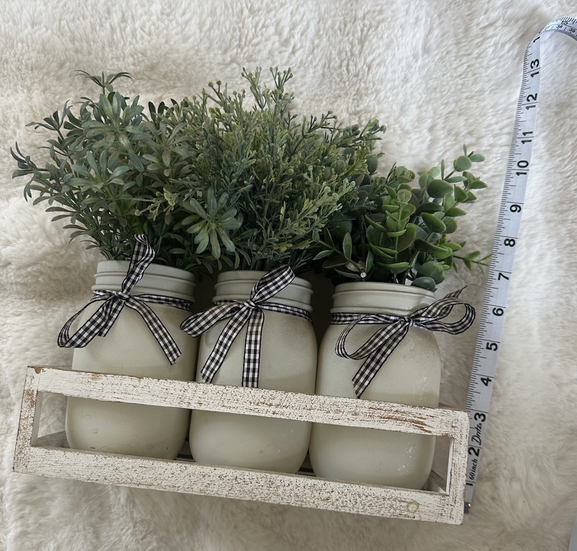 Artificial Eucalyptus Arrangement in White Mason Jars with Ribbon on Wooden Tray
