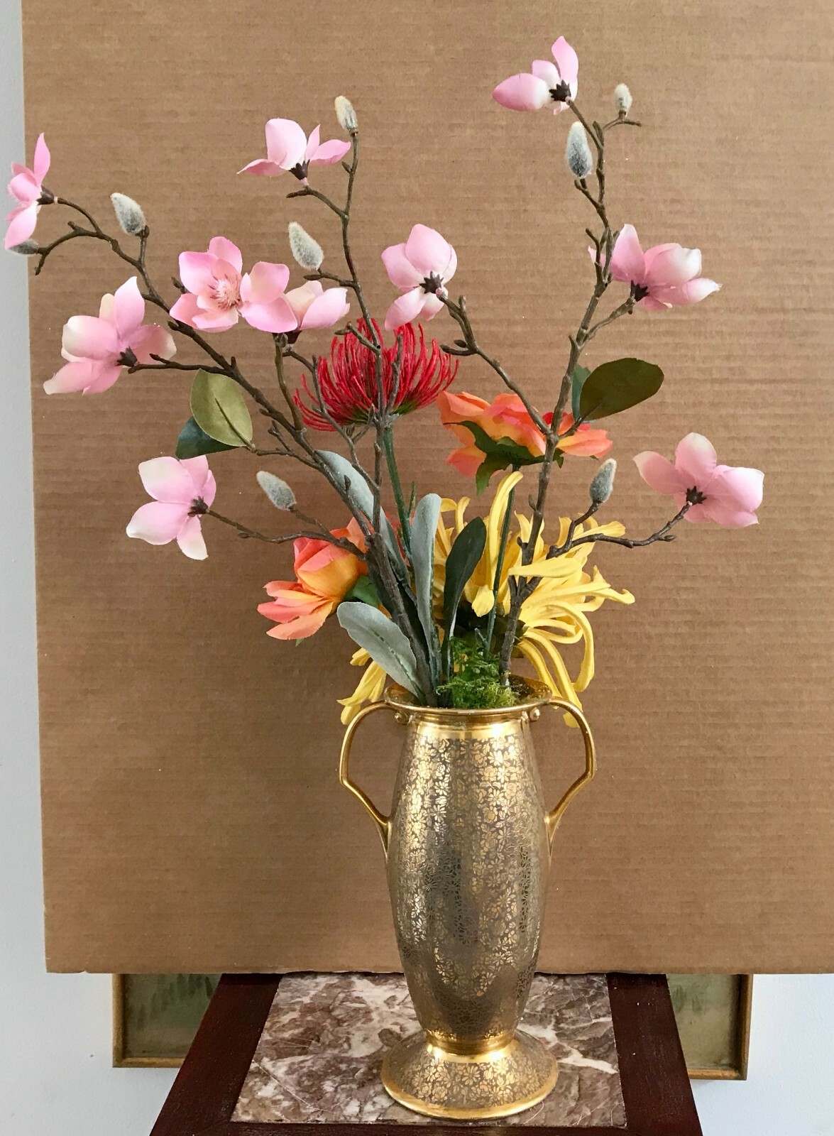 Floral Arrangement with Multi-Colored Silk Flowers in a Gold Colored Floral Vase