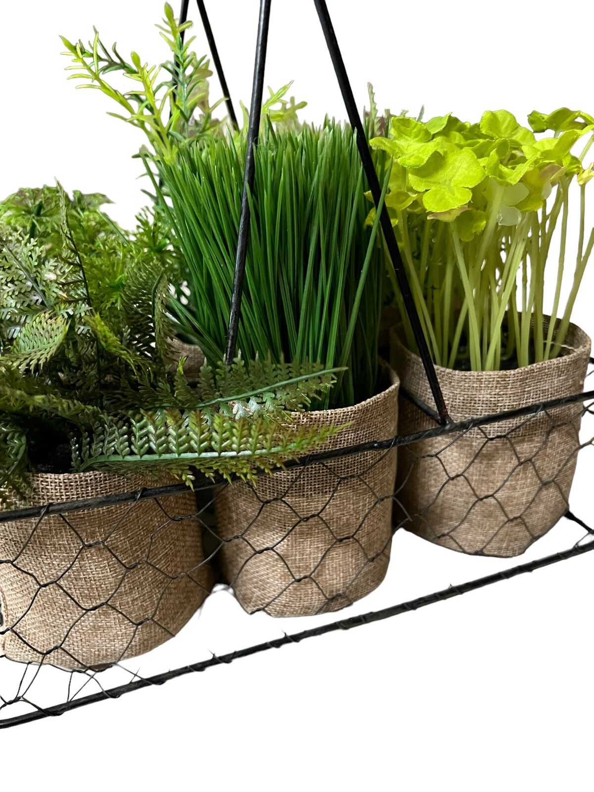 6 Artificial Plants In Burlap Containers Within A Metal Chicken Wire Carrier