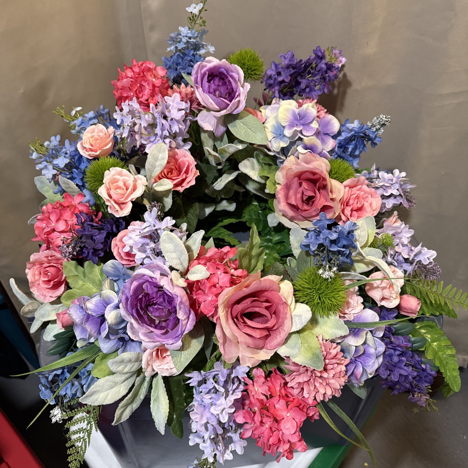 Floral Urn Ring Arrangement For Memorial Service 24” Round flowers Pinks, Blues