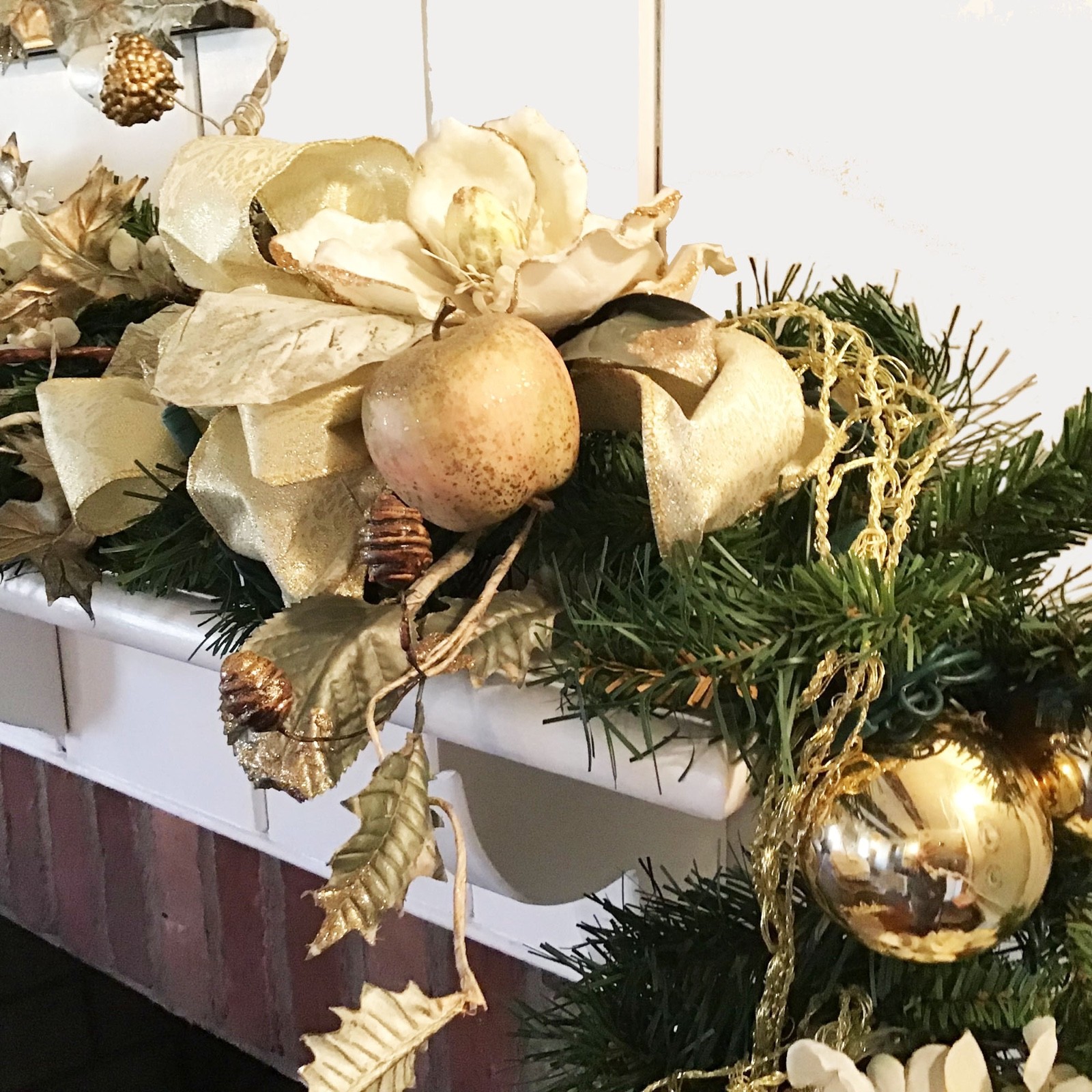 Holiday Swag with white silk Magnolias Hydrengeas Silver Glass Bubbles Gold