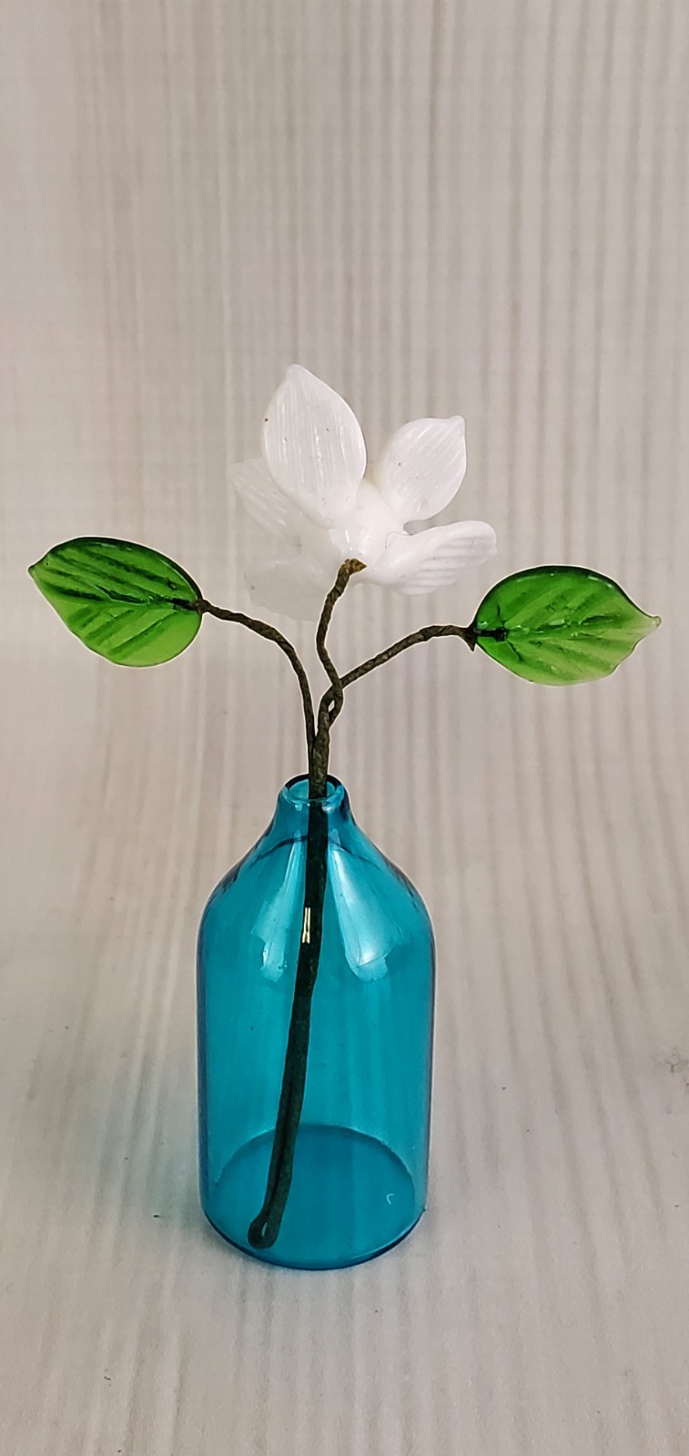 Tiny Glass Flower in Blue Vase 3.5″ tall – White Glass Flower & Green Leaves
