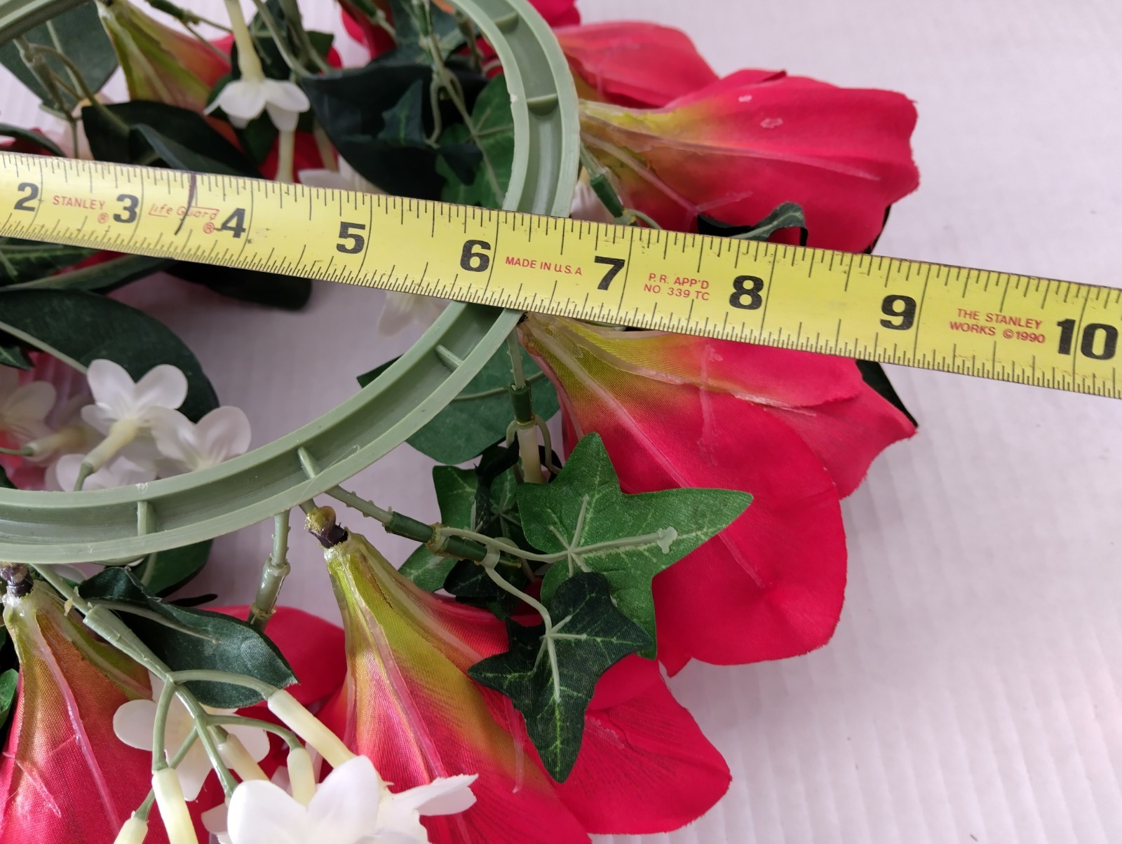 Bright red Amaryllis candle ring for a 6″ pillar candle or cremation urn.