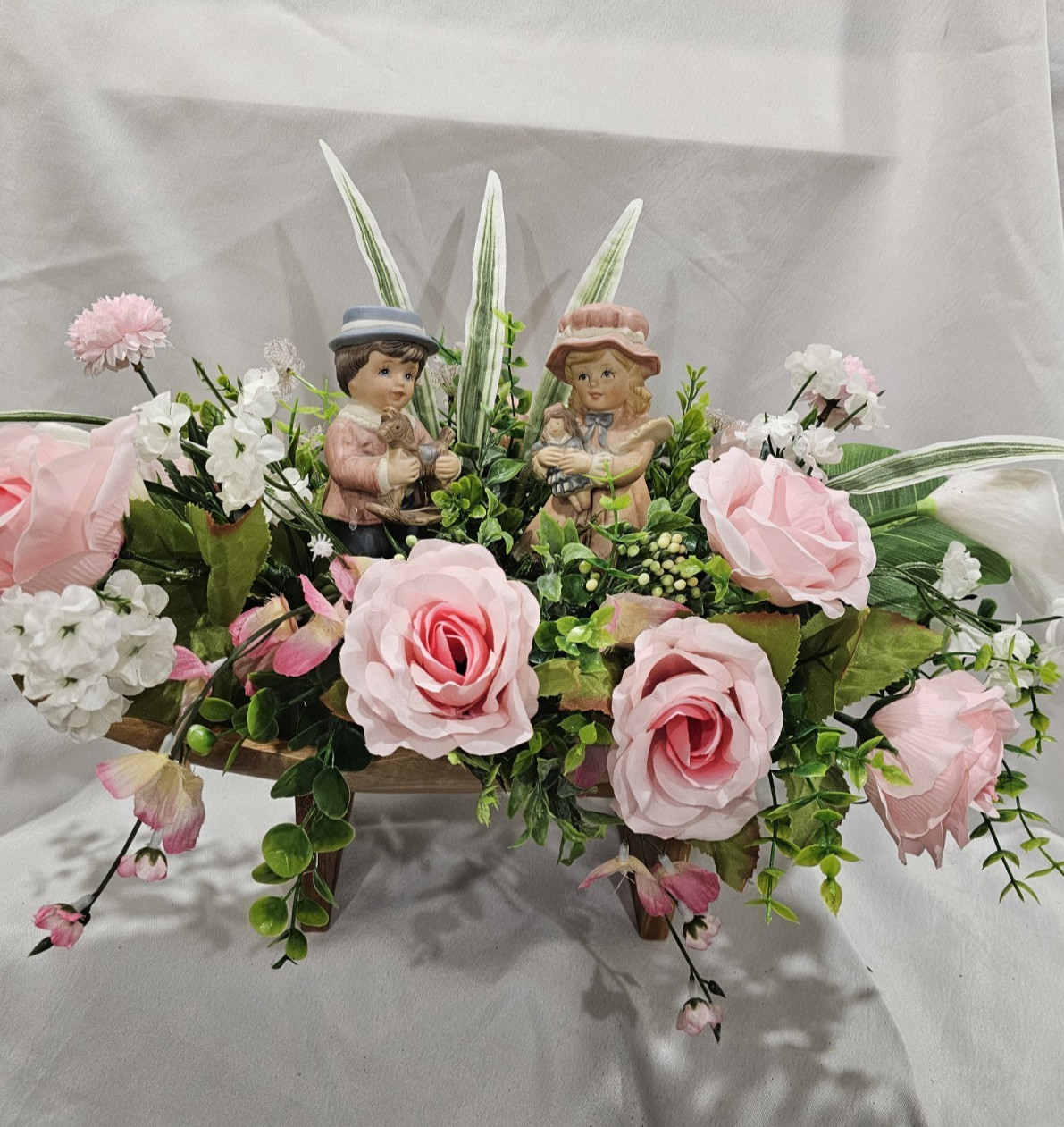 Lovely Floral Centerpiece, Pink Roses, 2 darling children. 15″W in solid wood