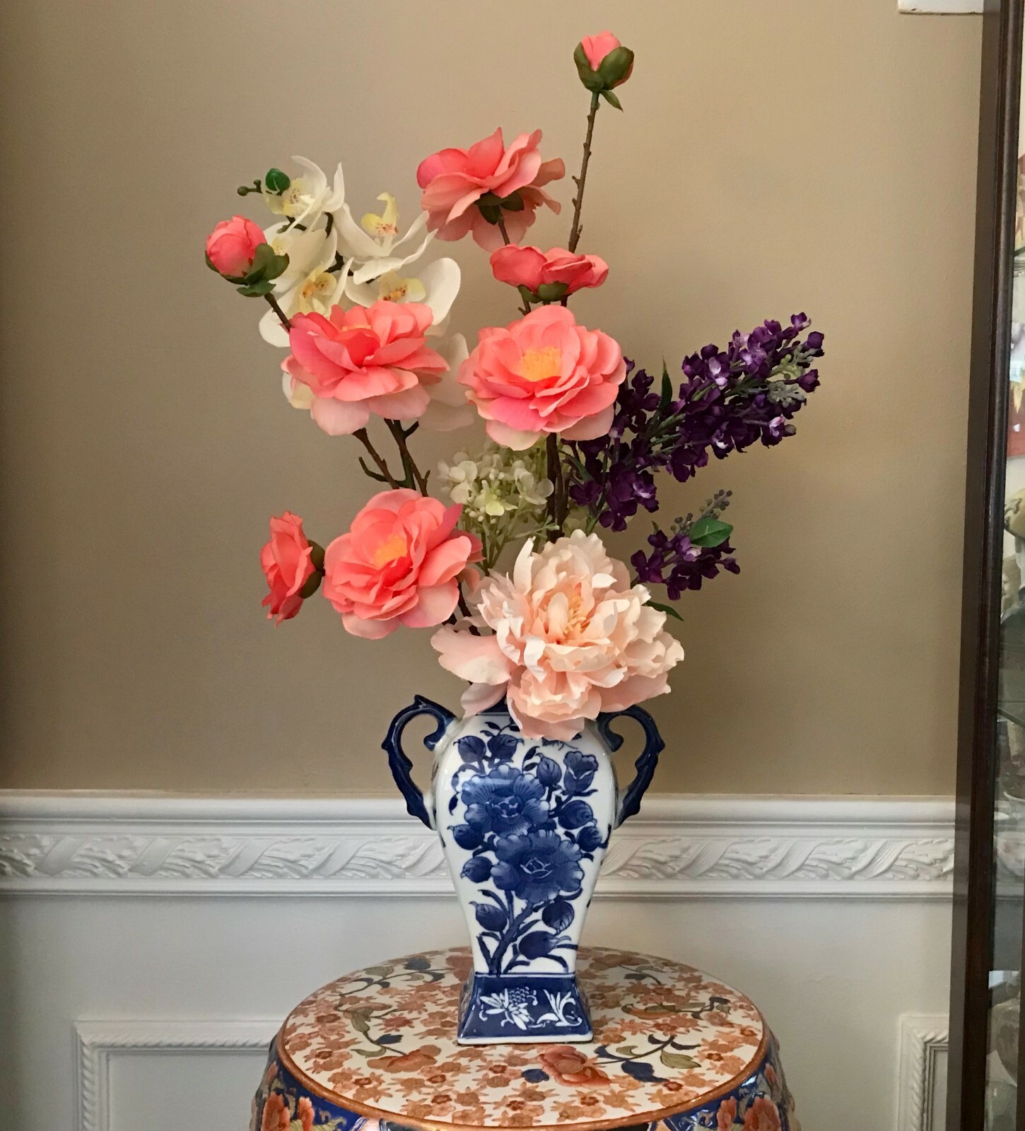 Floral Arrangement with Multi-Colored Silk Flowers in a Blue and White Floral Va