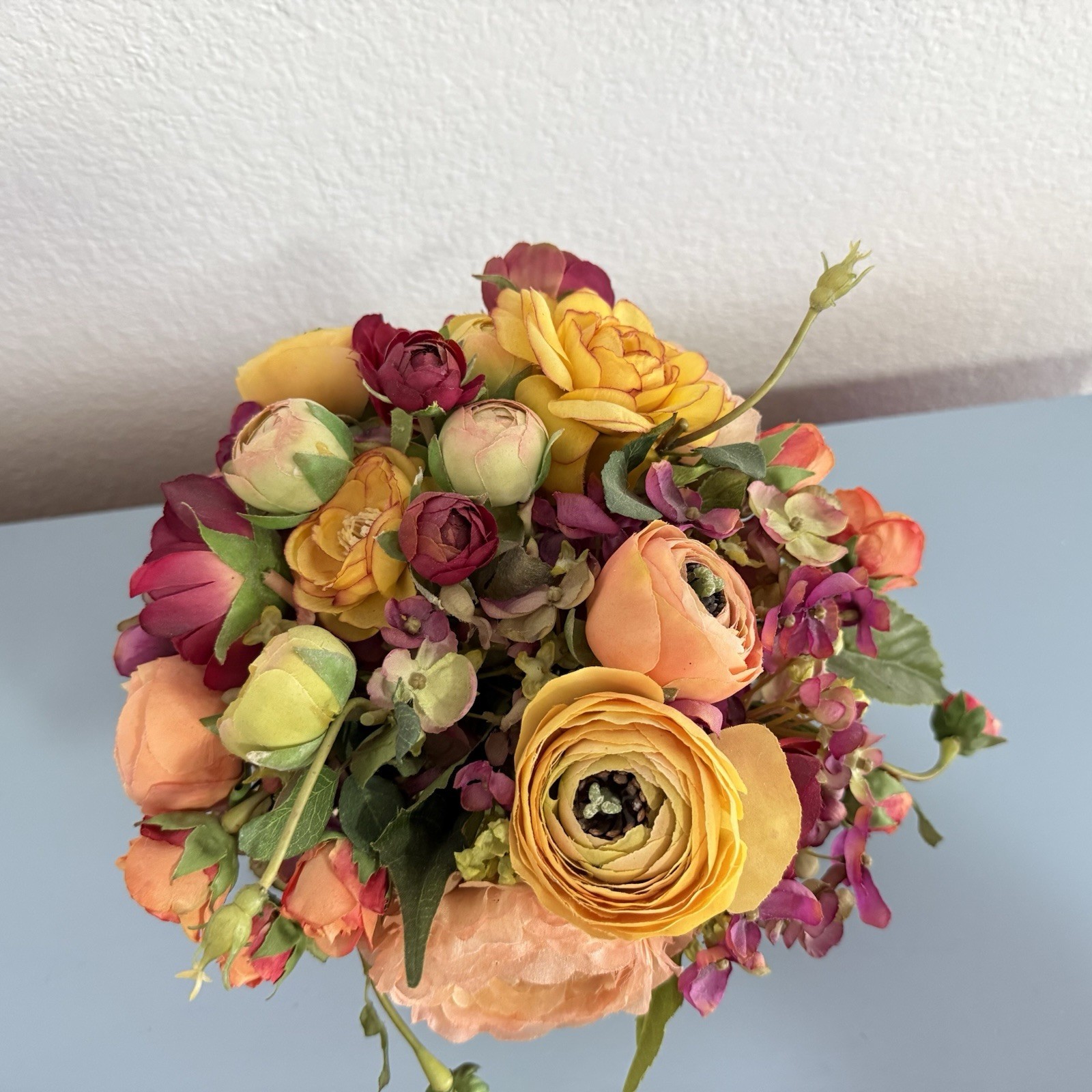 Beautiful Flower Arrangement in Glass Vase with Faux Water.