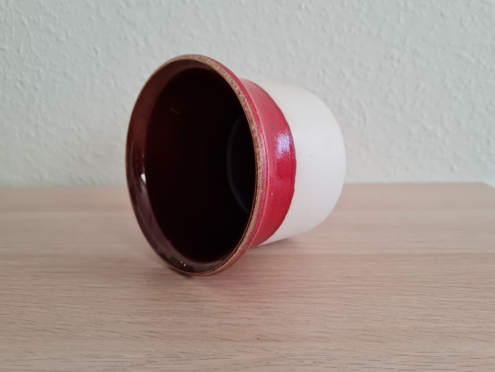 Red and white ceramic flower pot