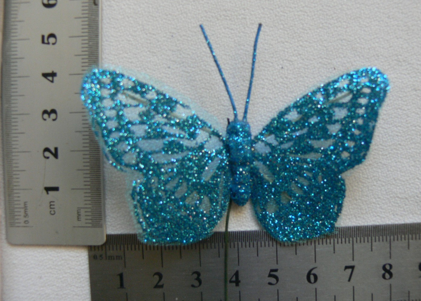 BUTTERFLY Pk 12 Piece CAPRI BLUE – 40x65mm – Antennae’s + Stem 12cm long – KSCRT