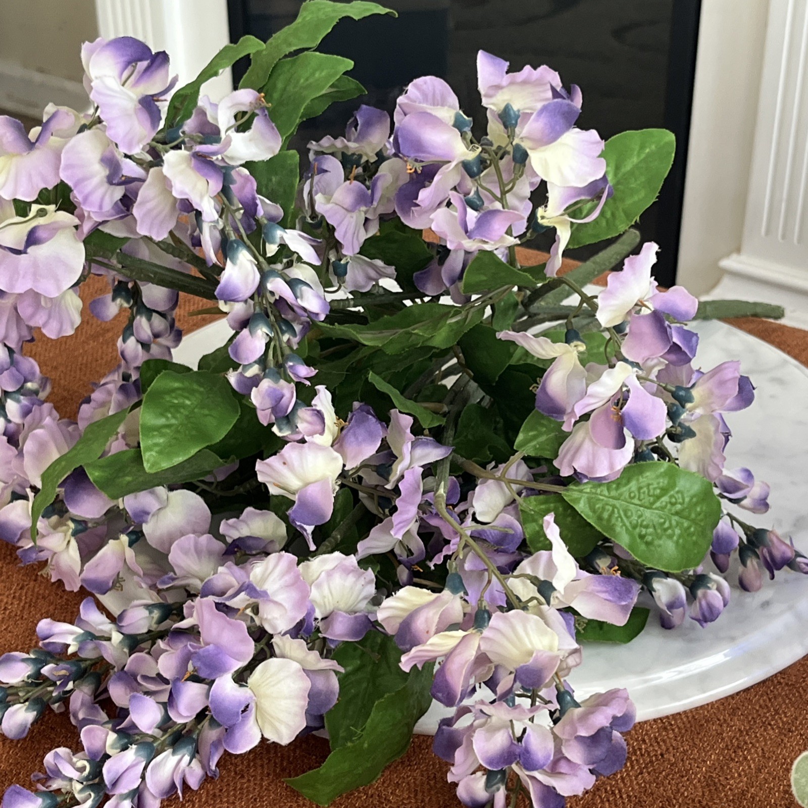 Flower Arrangement Cascading, Wisteria Purple in Cobalt Blue Glass Vase