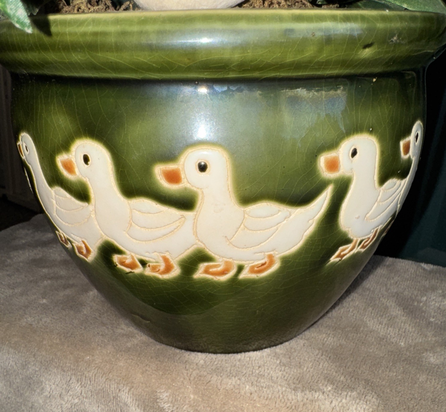 Vintage green ceramic pot featuring a pattern of ducks W/ Artificial Greenery