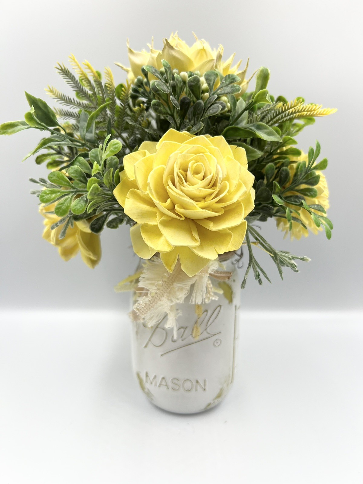 Yellow Sola Wood Flower Arrangement In Ball Canning Jar