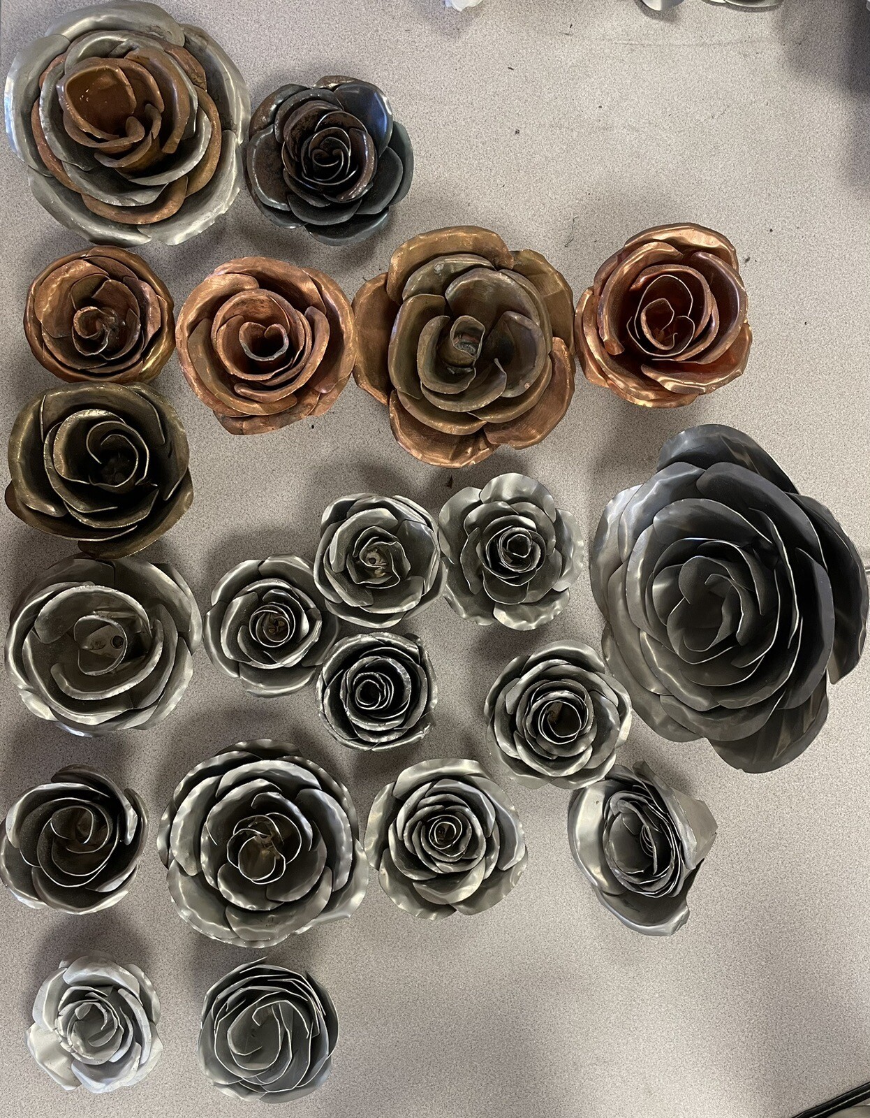 Metal Rose Flowers, handcrafted, bent, and welded. $15/Rose.