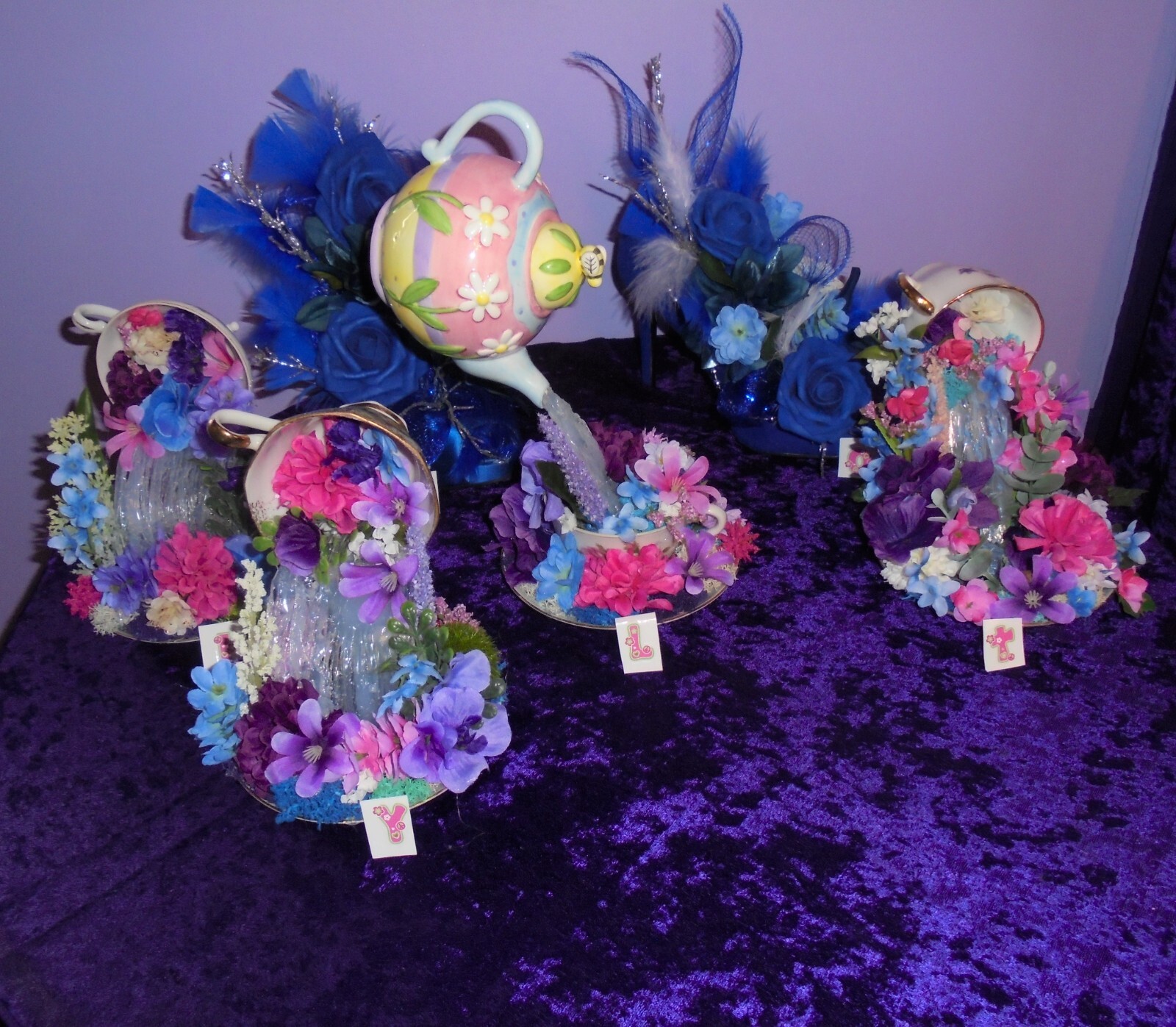 Floating Teacup floral arrangement Item # Y 