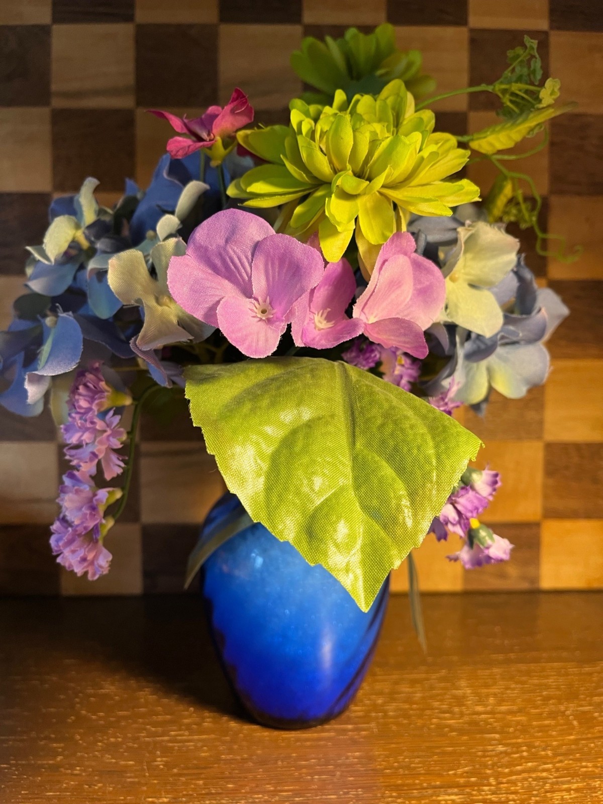 Floral Arrangement in Blue Vase