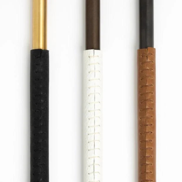 The Ellis Light is made from solid brass, with an optional leather wrap that is