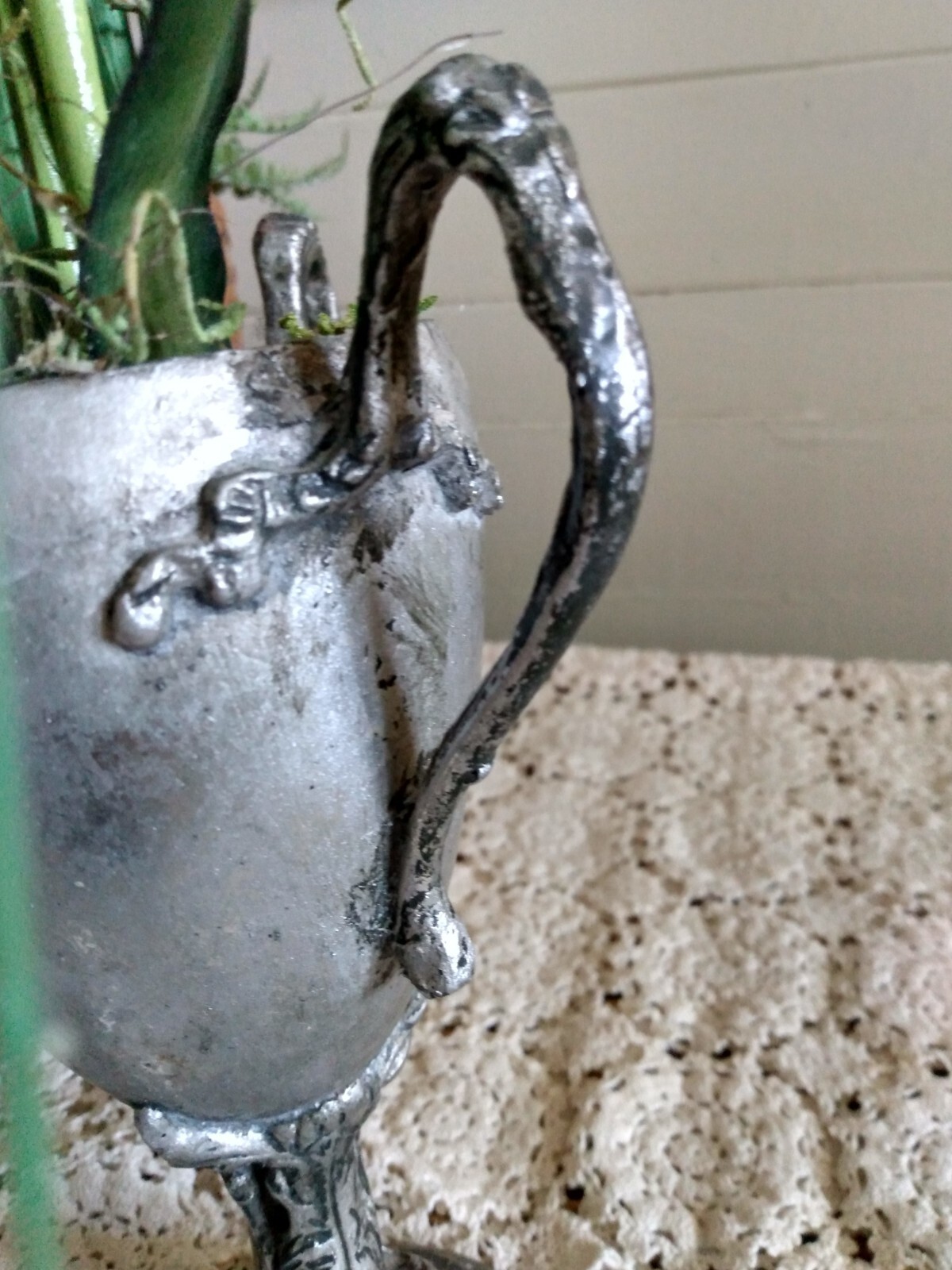 faux flower in urn
