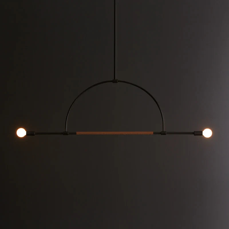 The Ellis Light is made from solid brass, with an optional leather wrap that is