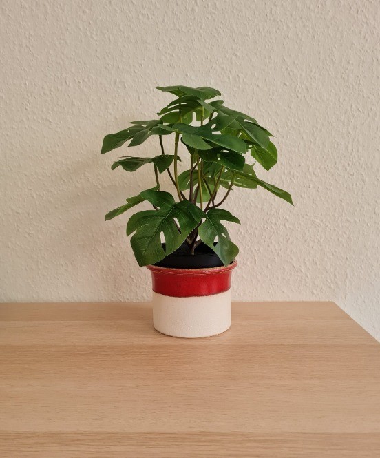 Red and white ceramic flower pot