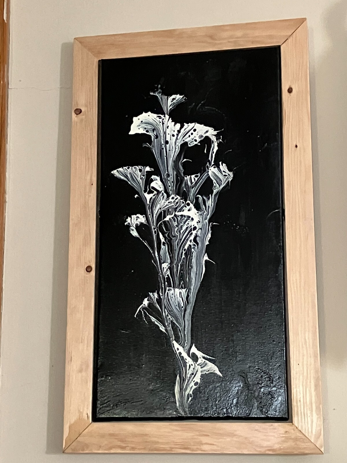 “Flower Arrangement” silver flowers and a black 12″ x 12″ canvas