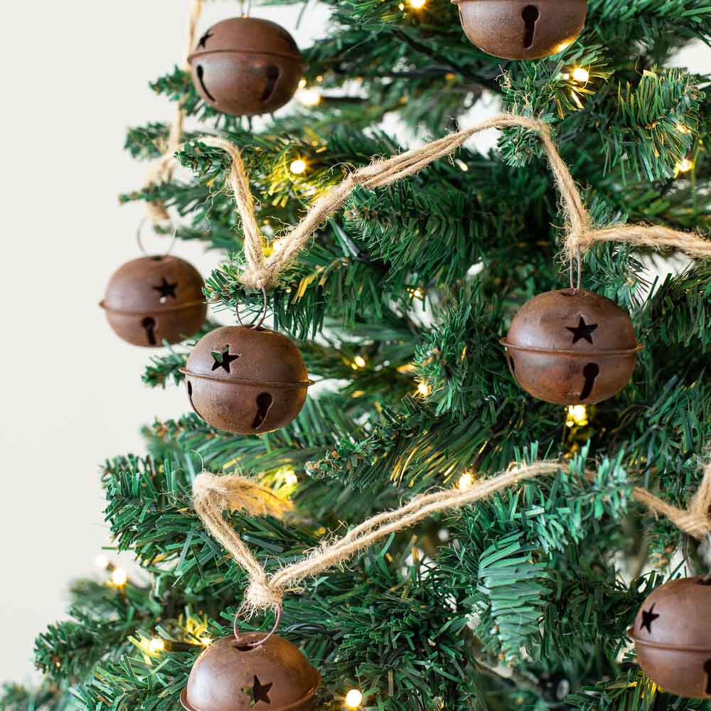 16 feet of Jute Rope Garland with Rusty Tin 2″ Sleigh Bells