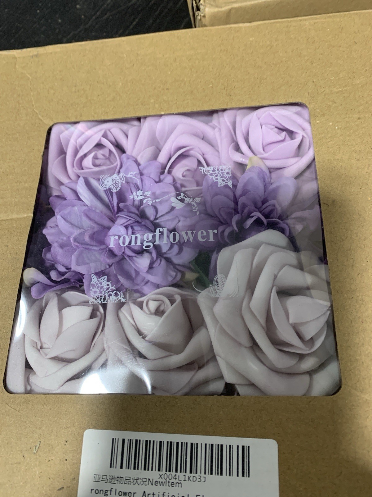 3 boxes of a variety of purple artificial flower heads aprox 3 dozen