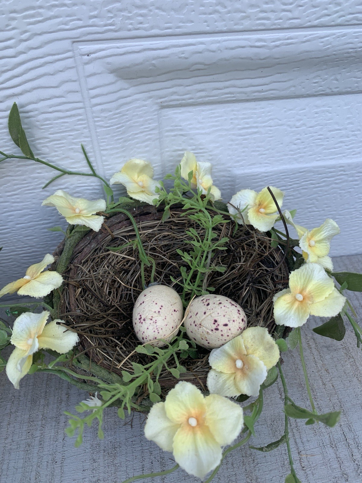 Decorative Bird’s Nest With 2 Faux Eggs And Yellow Artificial Flowers Spring