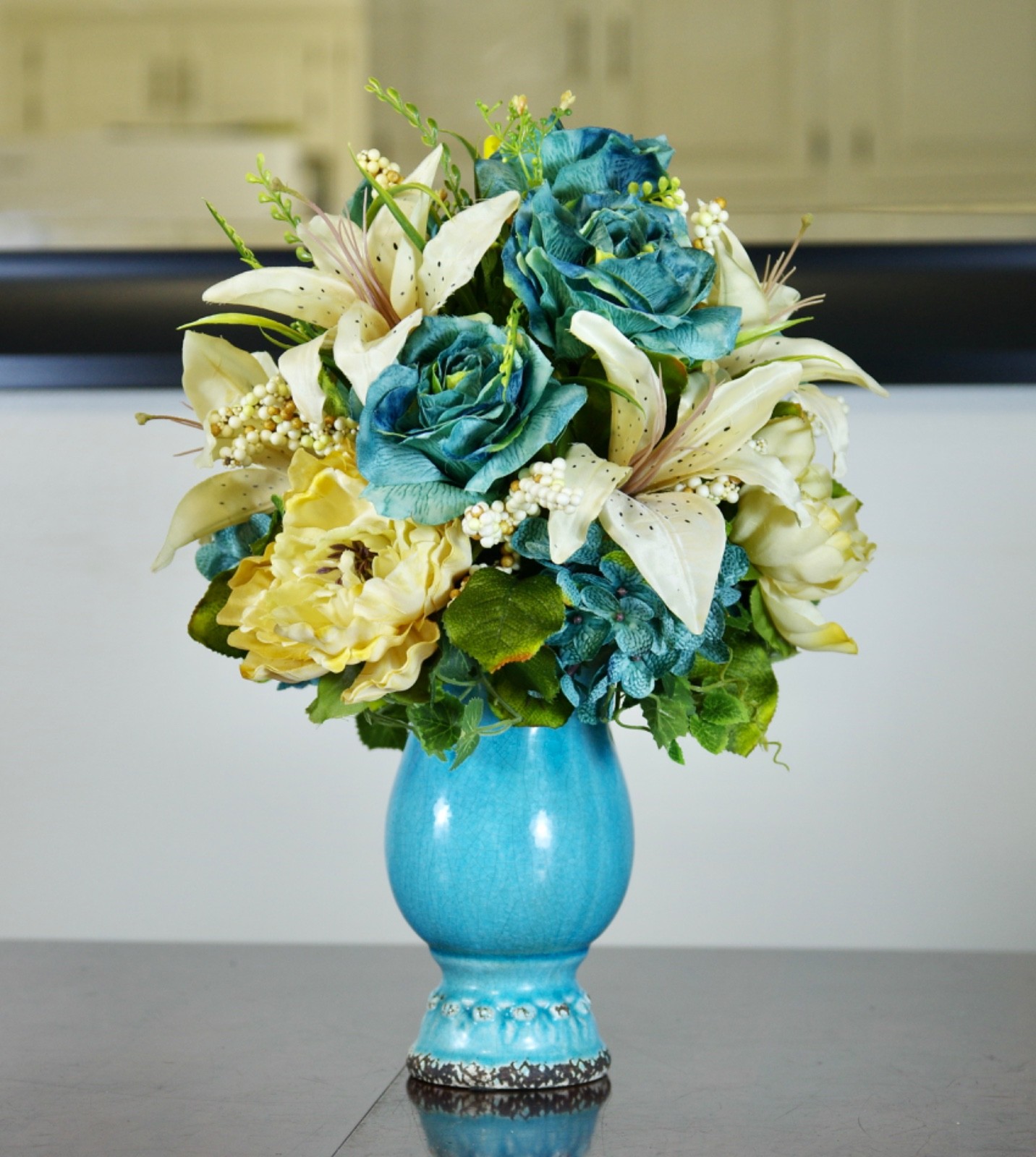 Silk Arrangement of Blue Roses, Hydrangeas and Beige Lilies in Blue Ceramic Vase