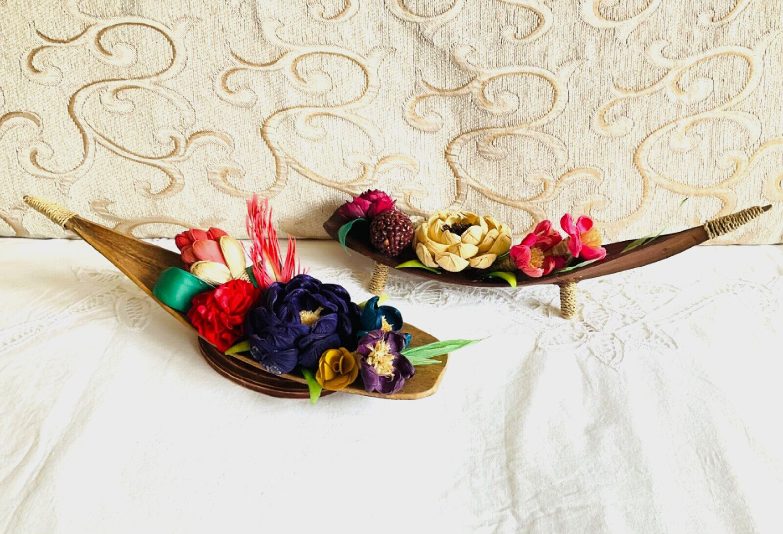 flower arrangements. Coconut spathe vase, dried corn husks, naturals.