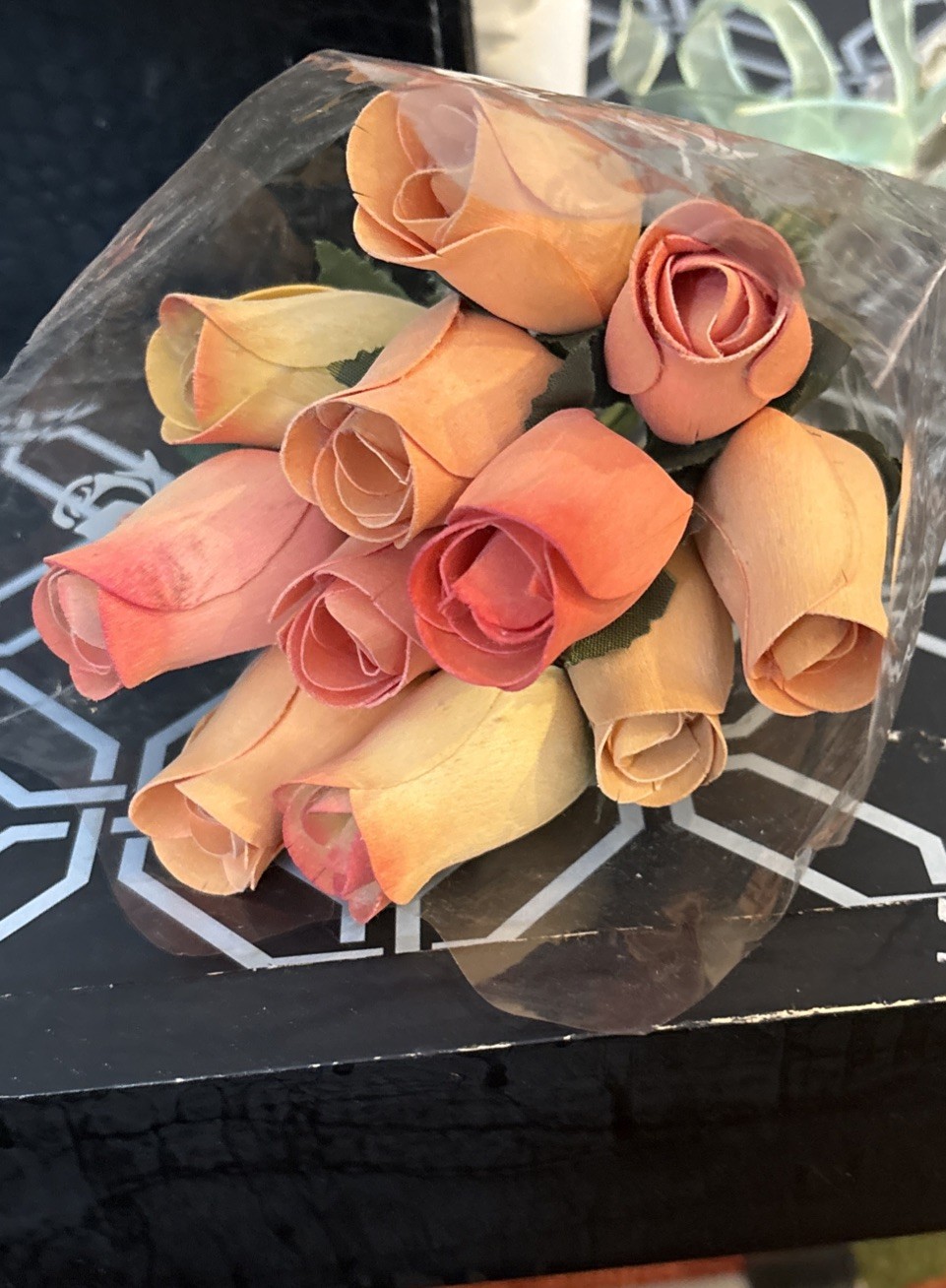 coral bouquet of 12 Closed Bud Wooden Roses