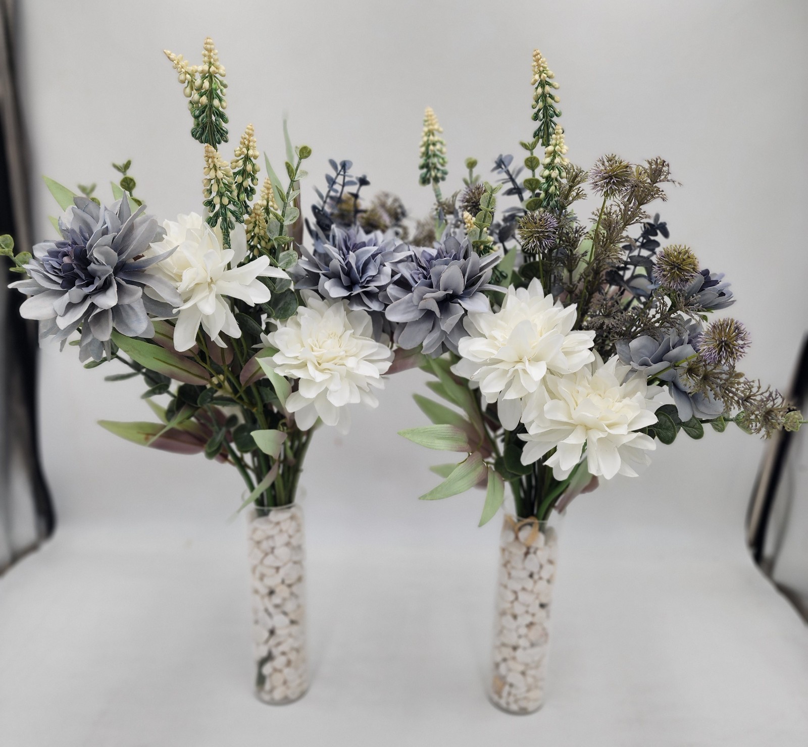 2 beautiful flower arrangements with vases included blue and white stands 20″